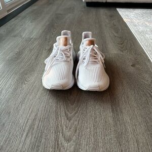 adidas White Athletic Shoes with Gold Accents